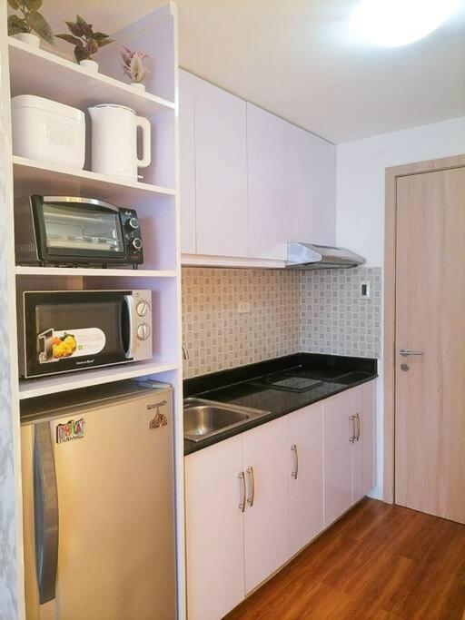 Cozy Studio Unit At Sun Residences Quezon City Extérieur photo